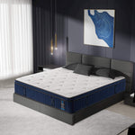 Blue and white mattress on a bed in a modern bedroom setting